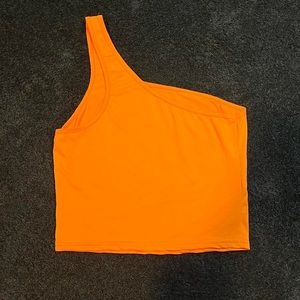 neon orange one shoulder tank top from blushmark